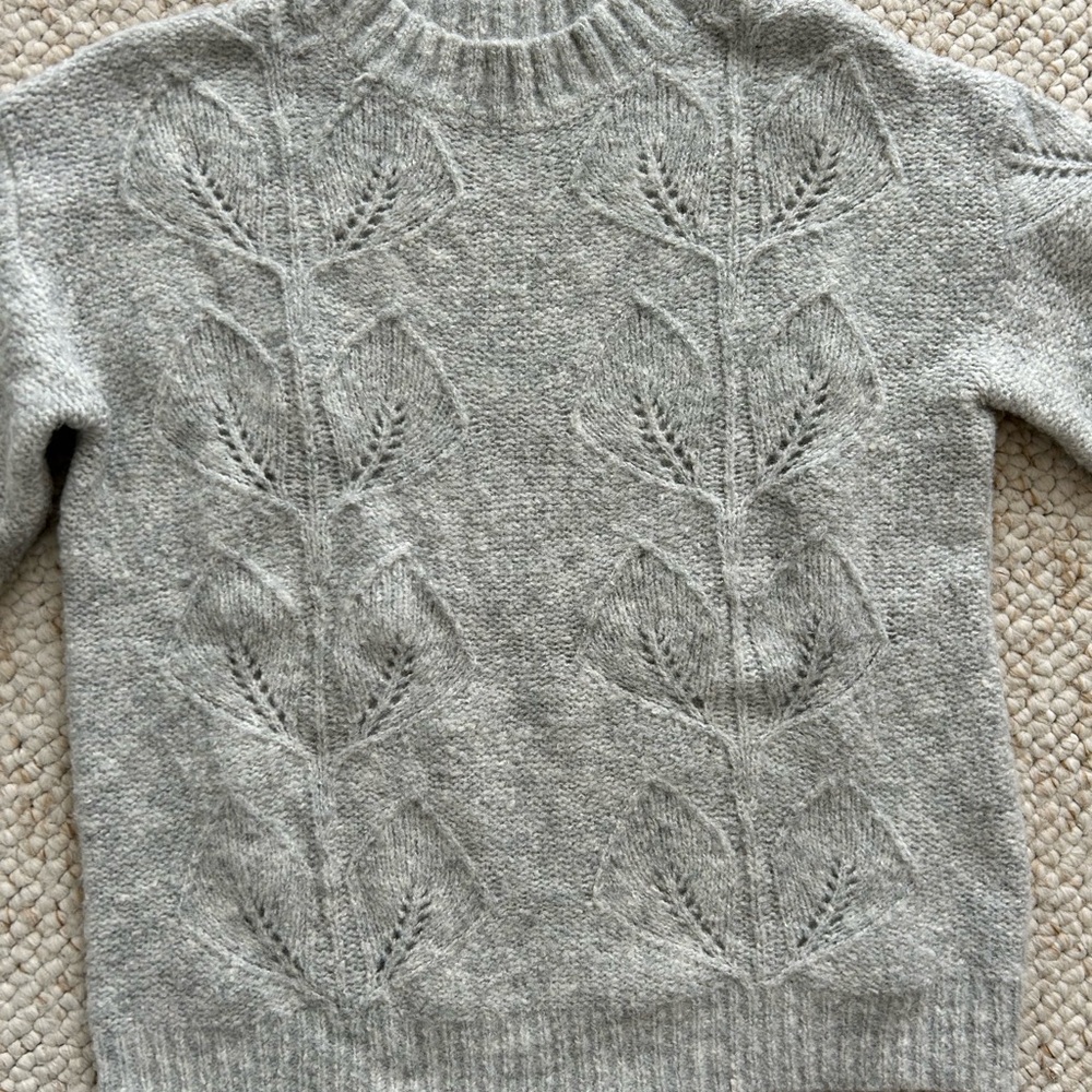Gray sweater with details